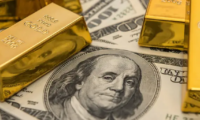 حالة ركود في الأسواق الأمريكية واتجاه إيجابي للدولار والذهب يرتفع 1.8%